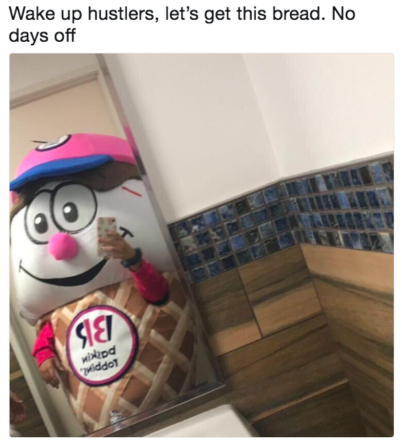 Baskin Robins Mascot taking a bathroom selfie. A quote on top of the image reads: 'Wake up hustlers, let's get this bread. No days off.'